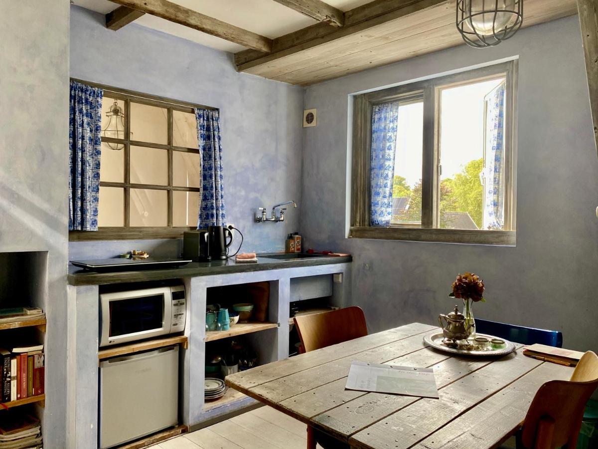 In De Aap - Appartementen & Guesthouse ベルゲン エクステリア 写真